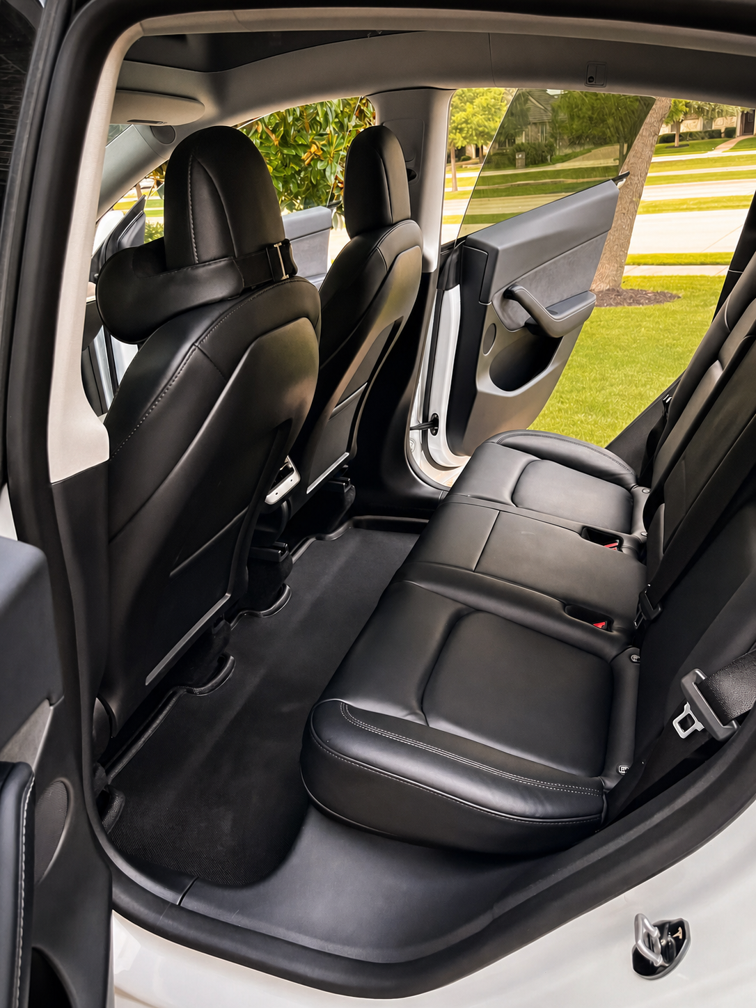 Freshly detailed dark leather interior by Evo Auto Details mobile service