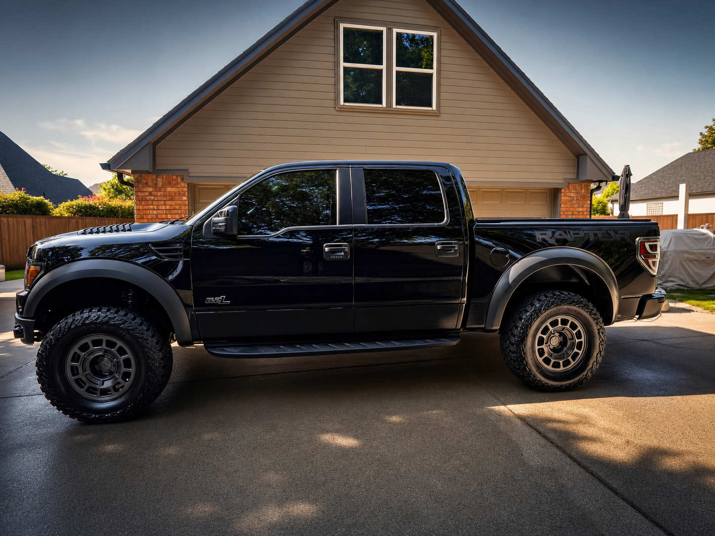 Black lifted truck after paint correction and detail by Evo Auto Details